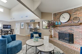 Spacious living room with fireplace and vaulted ceiling
